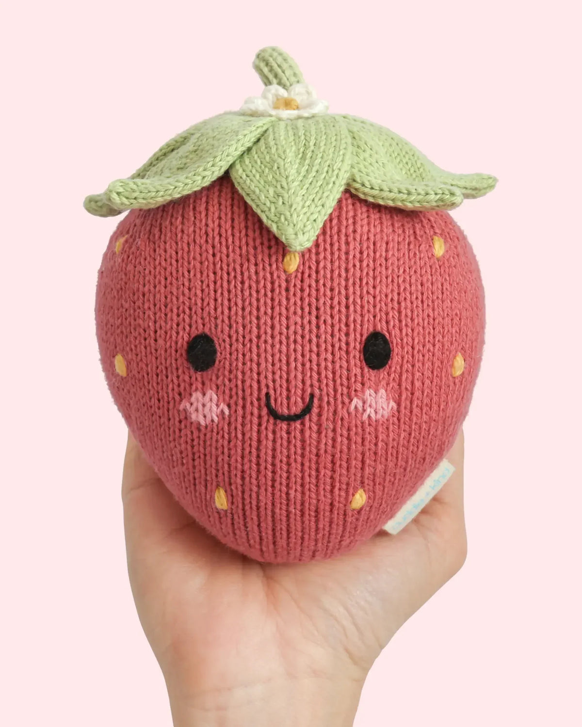 Bébé fraise en peluche