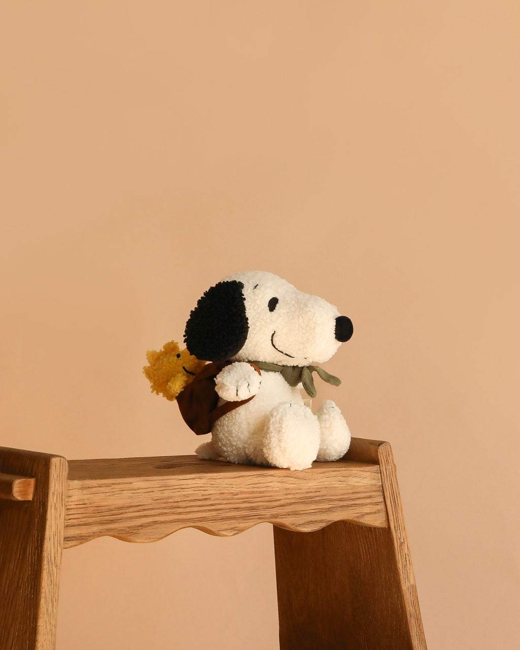 Peluche Snoopy avec Woodstock dans un sac à dos